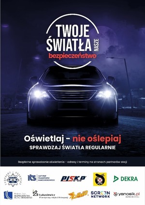 plakat promujący akcję, na ciemny tle samochód z jasnymi światłami mijania i hasło&quot; Twoje światła, nasze bezpieczeństwo&quot;